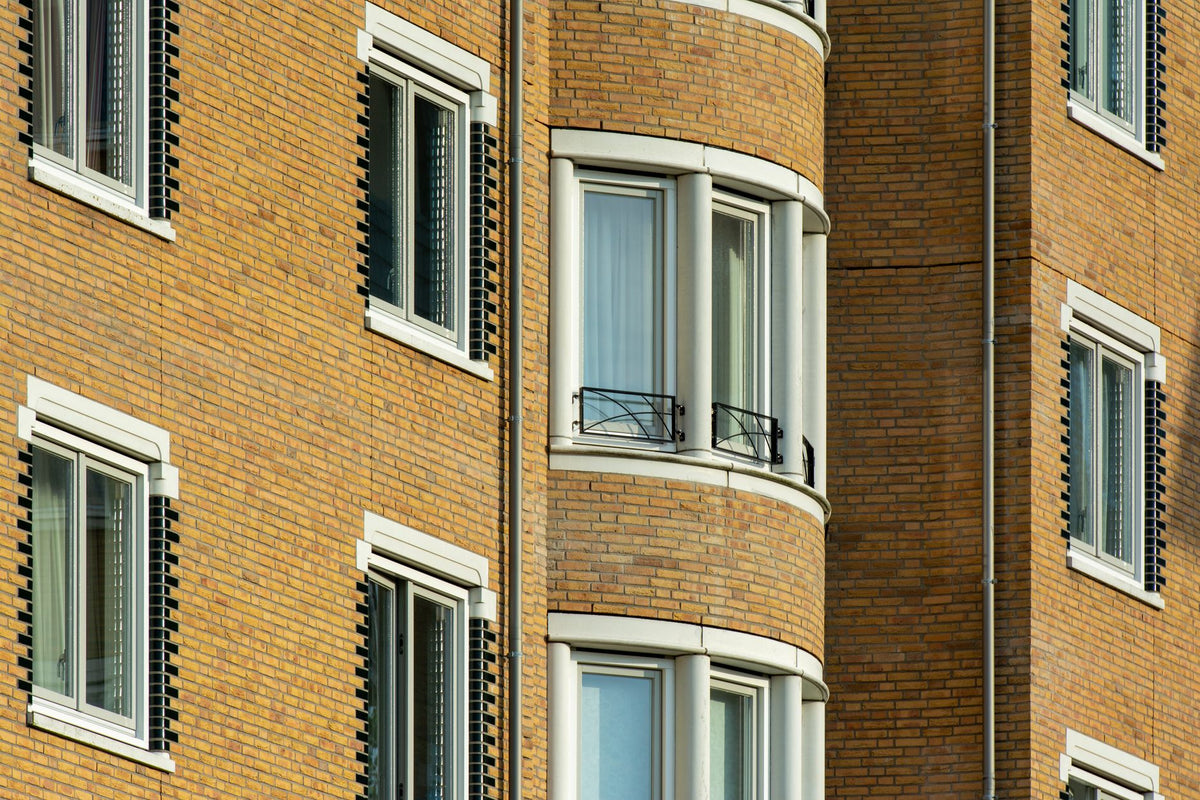 Close-up of a brick residential building facade in Voorschoten, Netherlands.
