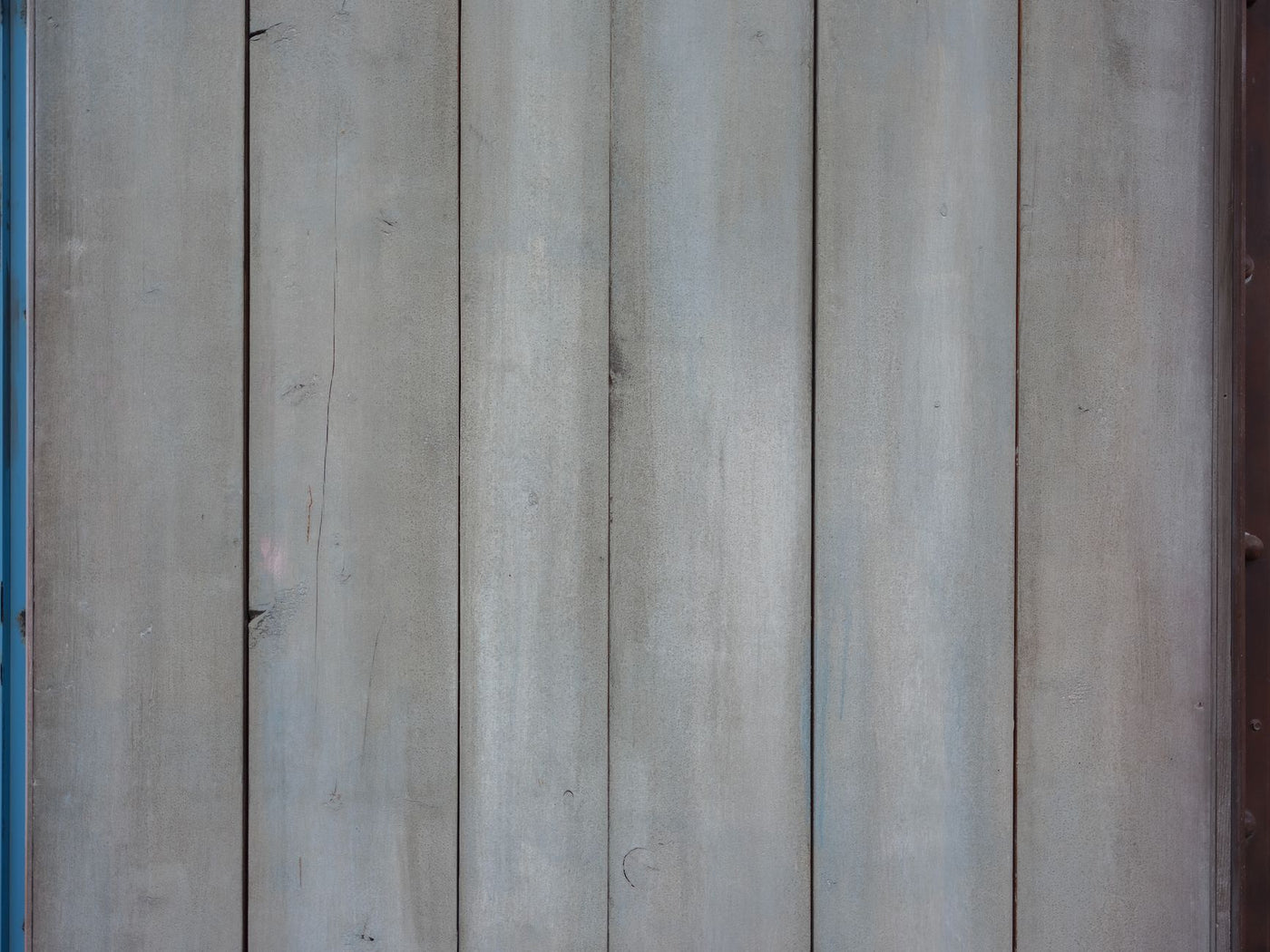 A rustic and weathered wooden wall texture, perfect for backgrounds and design projects.
