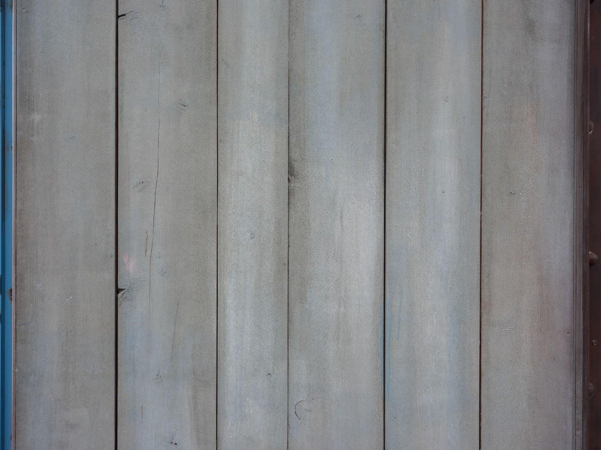 A rustic and weathered wooden wall texture, perfect for backgrounds and design projects.